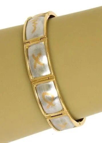 TIFFANY & CO. PICASSO BRACELET PLATINUM & 18K YELLOW GOLD: TIFFANY & CO. PICASSO BRACELET PLATINUM & 18K YELLOW GOLD The Tiffany & Co. Picasso Bracelet is a luxurious piece of fine jewelry crafted from platinum and 18k yellow gold. With a stylish slide closur