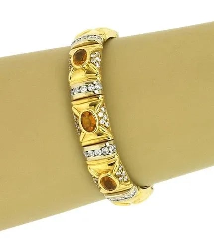 DIAMOND & CITRINE GOLD BRACELET 18K TWO TONE BAR LINK STYLE: DIAMOND & CITRINE GOLD BRACELET 18K TWO TONE BAR LINK STYLE This is a stunning estate bracelet, with diamonds and citrine. The piece is well crafted in 18k yellow gold with a nice, rounded flexible de