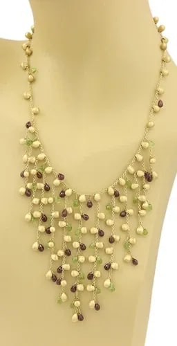 MARCO BICEGO PARADISE GOLD NECKLACE GEMSTONE 18K YELLOW FRINGE STYLE: MARCO BICEGO PARADISE GOLD NECKLACE GEMSTONE 18K YELLOW FRINGE STYLE This Marco Bicego Paradise Gold Necklace features a stunning fringe style design with red and green gemstones set in 18k yellow gol
