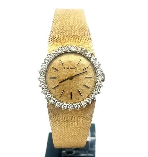 ROLEX DIAMOND GOLD WATCH 14K YELLOW VINTAGE LADIES HAND WIND: ROLEX DIAMOND GOLD WATCH 14K YELLOW VINTAGE LADIES HAND WIND This Rolex Diamond gold watch is a vintage luxury wristwatch designed for women. This manual hand wind watch features a yellow gold case wi