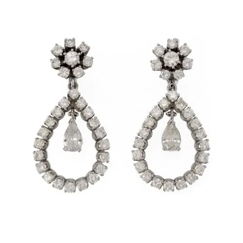 DIAMOND EARRINGS 14K WHITE GOLD DROP PEAR SHAPE: DIAMOND EARRINGS 14K WHITE GOLD DROP PEAR SHAPE Elegant Diamond 14k White Gold Drop Dangle Earrings Description This gorgeous pair of earrings are crafted from 14k white gold featuring a floral stud t