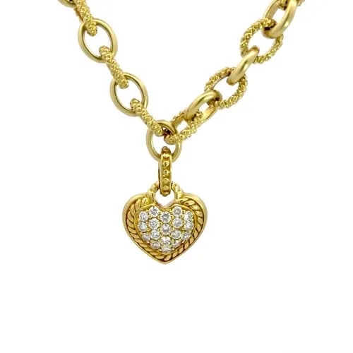 JUDITH RIPKA DIAMOND GOLD NECKLACE 18K YELLOW HEART PENDANT: The Judith Ripka diamond gold necklace is a stunning piece of fine jewelry featuring a heart-shaped pendant adorned with natural white diamonds in a pave setting. The necklace is crafted from 18k yell