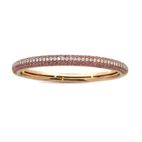 DIAMOND PINK SAPPHIRE GOLD BRACELET 18K ROSE HINGED PAVE SET BANGLE: DIAMOND PINK SAPPHIRE GOLD BRACELET 18K ROSE HINGED PAVE SET BANGLE This is an elegant bangle crafted from 18k rose gold featuring a 5mm dome shape, it is hinged one the side with push lock on the oth