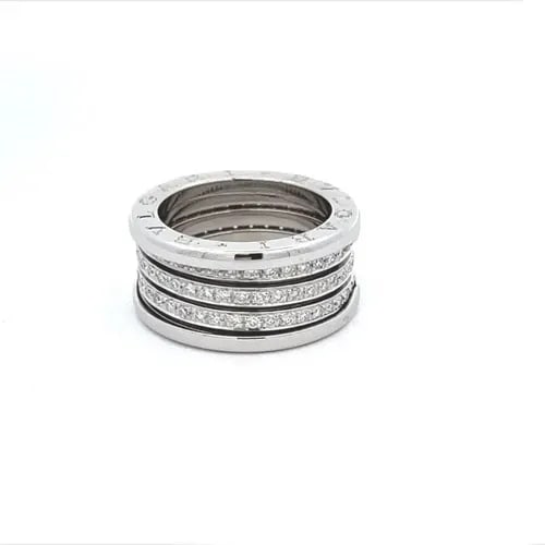 BVLGARI B. ZERO1 DIAMOND 18K WHITE GOLD 11MM WIDE BAND RING SIZE 55-US 7: BVLGARI B. ZERO1 DIAMOND 18K WHITE GOLD 11MM WIDE BAND RING SIZE 55-US 7 Bvlgari B. Zero1 Diamond 18k White Gold 11mm Wide Band Ring Size 55-US 7 Description This authentic Bulgari band ring is finely