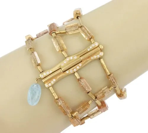 H.STERN DIAMOND & GEMS18K YELLOW GOLD 3 STRAND WIDE BRACELET W/BOX: H.STERN DIAMOND & GEMS18K YELLOW GOLD 3 STRAND WIDE BRACELET W/BOX H.Stern Diamond & Gems18k Yellow Gold 3 Strand Wide Bracelet w/Box Description This is a chic authentic bracelet from H.Stern, it is 