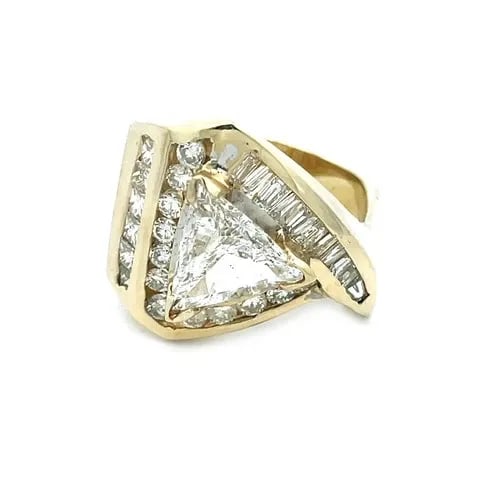 DIAMOND TRILLION CUT 3CT GOLD RING MEN'S 12K YELLOW 2CT ASSORTED SHAPE: DIAMOND TRILLION CUT 3CT GOLD RING MEN'S 12K YELLOW 2CT ASSORTED SHAPE The product is a stylish and sophisticated men's ring featuring a 3ct trillion cut natural diamond as the main stone, surrounded 