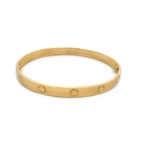 CARTIER LOVE ALDO CIPULLO GOLD BANGLE 18K YELLOW SIZE 1970'S SIZE 18 BOX: CARTIER LOVE ALDO CIPULLO GOLD BANGLE 18K YELLOW SIZE 1970'S SIZE 18 BOX The lovely Cartier bangle is an early vintage piece famously signed by Aldo Cipullo from the 1970's, made of 18k yellow gold. S