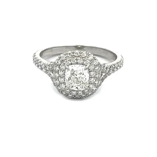 TIFFANY & CO. SOLESTE DIAMOND ENGAGEMENT RING PLATINUM HALO BOX PAPER $9950: TIFFANY & CO. SOLESTE DIAMOND ENGAGEMENT RING PLATINUM HALO BOX PAPER $9950 This stunning authentic engagement ring is by Tiffany & Co. from the Soleste Collection. It is classically elegant with a cu