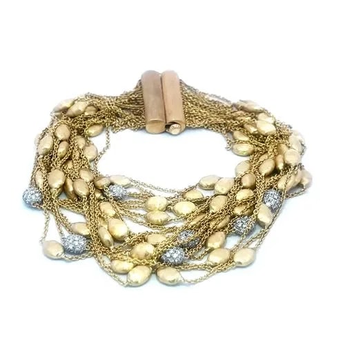 MARCO BICEGO SIVIGLIA GOLD BRACELET DIAMOND 18K YELLOW MULTI-STRAND BEADED: From the Siviglia Collection by Marco Bicego, this eye-catching chic multi-strand bracelet is crafted from 18k yellow gold with white gold accent 20 strands of fine oval link chain, each with satin fi