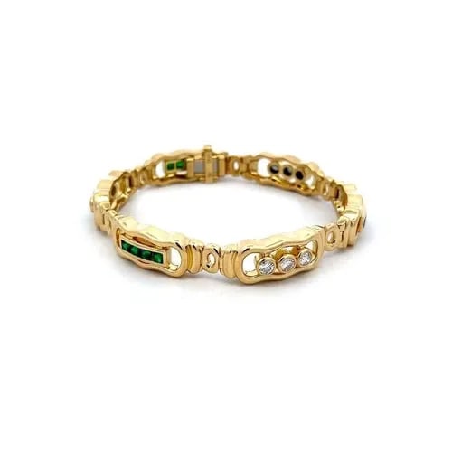 EMERALD & DIAMOND 18K YELLOW GOLD OPEN LONG LINK BRACELET: EMERALD & DIAMOND 18K YELLOW GOLD OPEN LONG LINK BRACELET This is a gorgeous bracelet, it is crafted from 18k yellow gold with a smooth polished finish featuring 6 long open style wave border frame, t