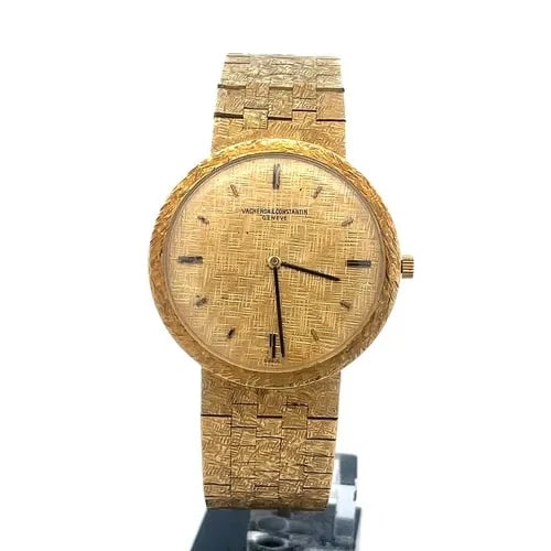 VACHERON CONSTANTIN MEN'S GOLD WATCH 18K YELLOW CASE & BAND MANUAL WIND: VACHERON CONSTANTIN MEN'S GOLD WATCH 18K YELLOW CASE & BAND MANUAL WIND This is an elegant authentic men's wristwatch is from Vacheron Constantin, the case and band is crafted from 18k yellow gold fea