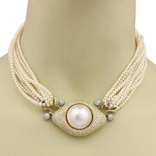 DIAMOND PEARL GOLD NECKLACE 4CT MABE 18K PENDANT MULTI-STRAND PAVE SET: DIAMOND PEARL GOLD NECKLACE 4CT MABE 18K PENDANT MULTI-STRAND PAVE SET This luxurious pearl and gold necklace is crafted from 18k yellow and white gold; the large almond shape pendant has a large beze