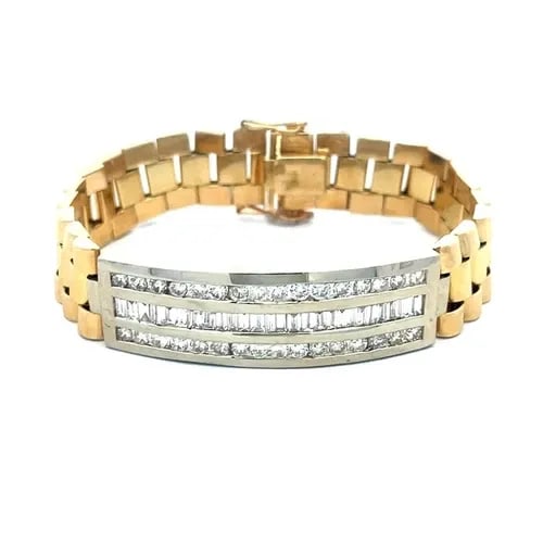 DIAMOND GOLD MEN'S BRACELET CURVED BAR JUBILEE LINK BRACELET: DIAMOND GOLD MEN'S BRACELET CURVED BAR JUBILEE LINK BRACELET This bold eye-catching men's bracelet is crafted from 14k yellow and white gold, the center has a 14mm wide curved bar with 3 rows of chann