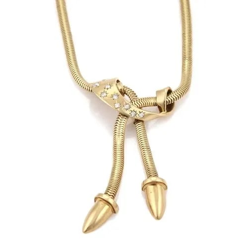 DIAMOND GOLD NECKLACE 14K RETRO TASSEL PENDANT VINTAGE: DIAMOND GOLD NECKLACE 14K RETRO TASSEL PENDANT VINTAGE This Diamond Gold Necklace features a retro tassel pendant made of 14k yellow gold. The vintage piece is adorned with a round-cut white/colorless