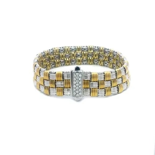 ROBERTO COIN APPASSIONATA GOLD BRACELET DIAMOND 18K TWO TONE BASKET STYLE: From the Appassionata Collection by Roberto Coin, this vintage bracelet is a stunning piece of fine jewelry featuring a triple row woven design in 18k yellow and white gold. This grooved style basket 