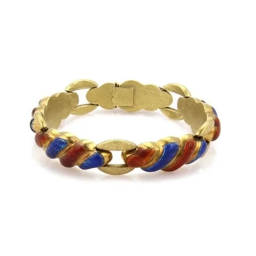 GOLD 18K ENAMEL BRACELET MULTI-COLOR SHELL LINK DESIGN: GOLD 18K ENAMEL BRACELET MULTI-COLOR SHELL LINK DESIGN This Gold Bracelet features a unique enamel shell link design, crafted with 18kt yellow gold. The slide closure allows for easy wear, and the bra