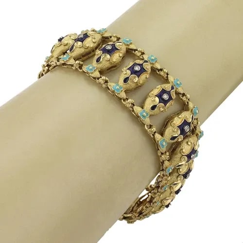 VINTAGE DIAMOND & ENAMEL 18K YELLOW GOLD WIDE FANCY FLORAL BRACELET: VINTAGE DIAMOND & ENAMEL 18K YELLOW GOLD WIDE FANCY FLORAL BRACELET Vintage Diamond & Enamel 18k Yellow Gold Wide Fancy Floral Flex Bracelet Description This lovely vintage bracelet is crafted from 18