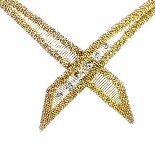 DIAMOND GOLD NECKLACE 14K YELLOW VINTAGE MESH RIBBON CROSSOVER STYLE: DIAMOND GOLD NECKLACE 14K YELLOW VINTAGE MESH RIBBON CROSSOVER STYLE The lovely vintage necklace is a fine piece of jewelry that exudes beauty with its 14k yellow gold mesh crossover bolo-style design