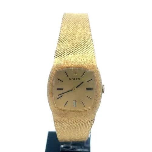 ROLEX VINTAGE GOLD WRISTWATCH 14K YELLOW MANUAL WIND WOMEN: ROLEX VINTAGE GOLD WRISTWATCH 14K YELLOW MANUAL WIND WOMEN This is a vintage Rolex wristwatch for women with14k yellow gold case attached to the satin textured bracelet. It features a cushion-shaped t
