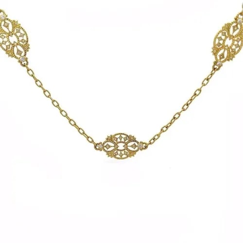 JUDITH RIPKA DIAMOND NECKLACE 18K YELLOW 10 GOLD FLORAL MOTIFS 34" LONG: JUDITH RIPKA DIAMOND NECKLACE 18K YELLOW 10 GOLD FLORAL MOTIFS 34" LONG This beautiful long authentic necklace is by Judith Ripka, it is crafted from 18k yellow gold featuring a fine textured oval lin