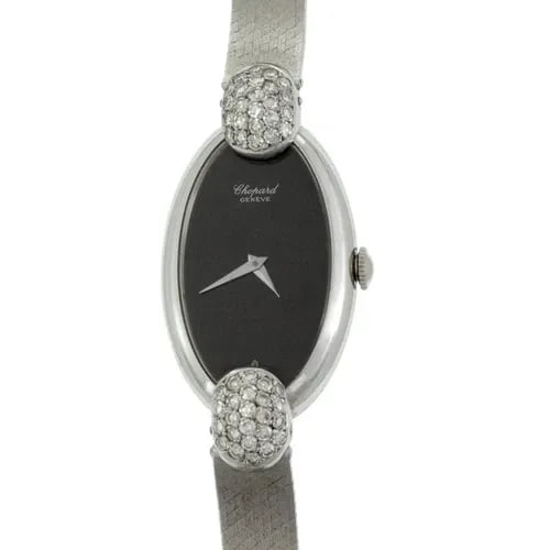 CHOPARD DIAMOND GOLD WATCH 18K WHITE LADIES ONYX OVAL SHAPE VINTAGE: Chopard Pave Diamond Lugs 18k White Gold Ladies Onyx Watch Description These beautiful authentic ladies' wristwatch is by Chopard. The case and band is crafted from 18k white gold featuring an oval sh