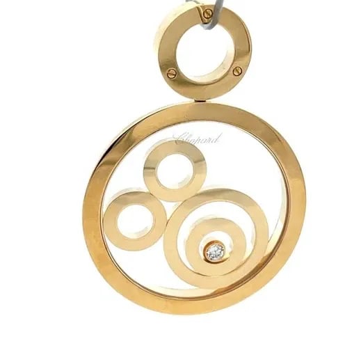 CHOPARD HAPPY SPORT PENDANT 18K YELLOW GOLD HEAVY DIAMOND FLOATING RINGS: CHOPARD HAPPY SPORT PENDANT 18K YELLOW GOLD HEAVY DIAMOND FLOATING RINGS This is an authentic large pendant by Chopard from the Happy Sport Collection. It is crafted from 18k yellow gold featuring mul