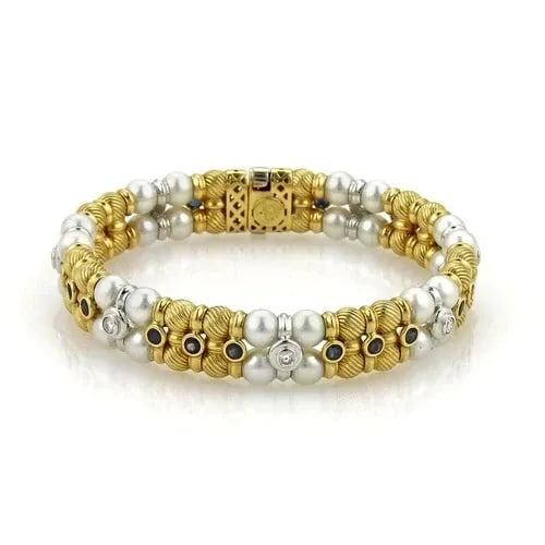 ZANCAN DIAMOND & GEMS GOLD BRACELET 18K YELLOW 2 ROW BEAD STYLE: ZANCAN DIAMOND & GEMS GOLD BRACELET 18K YELLOW 2 ROW BEAD STYLE This beautiful bracelet is from designer ZANCAN, it is crafted from 18k yellow and white gold with a polished and textured finish. It ha