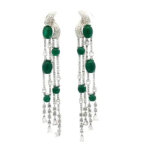 EMERALD DIAMOND GOLD EARRINGS 18K WHITE 6.5CT 4 STRAND DANGLE STYLE: This pair of luxurious earrings are crafted from 18k white gold featuring 4 slim long strands in a set of two with oval cabochon emerald with smaller round emeralds in prong setting attached to the st