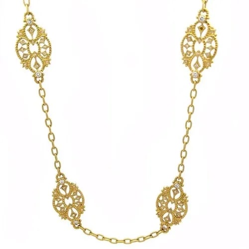 JUDITH RIPKA DIAMOND NECKLACE 18K YELLOW GOLD 6 FLORAL MOTIFS: JUDITH RIPKA DIAMOND NECKLACE 18K YELLOW GOLD 6 FLORAL MOTIFS This beautiful long authentic necklace is by Judith Ripka, it is crafted from 18k yellow gold featuring a fine textured oval link chain wi
