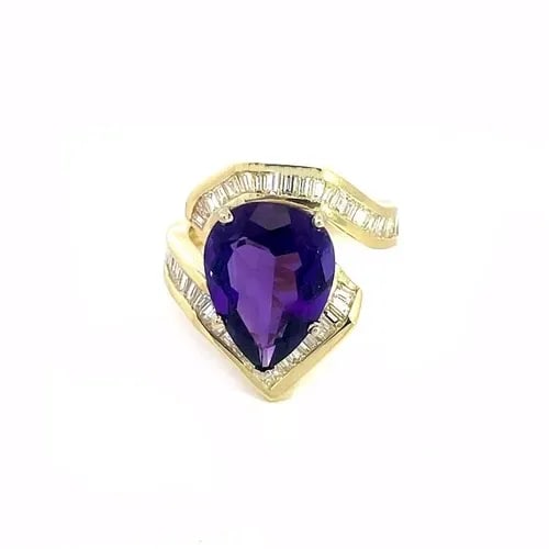 DIAMOND AMETHYST GOLD RING 18K TWO TONE LARGE PEAR SHAPE AMETHYST: DIAMOND AMETHYST GOLD RING 18K TWO TONE LARGE PEAR SHAPE AMETHYST This is a gorgeous eye-catching large pear shape cocktail ring. It is crafted from 18k yellow gold featuring an open pear shape bridge