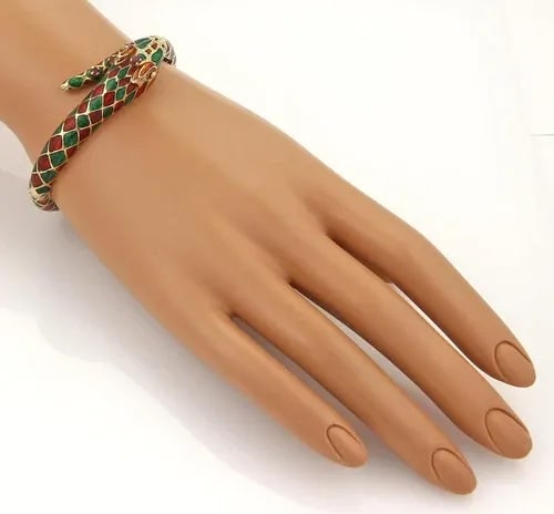 GOLD ENAMEL SNAKE BRACELET VINTAGE 14K YELLOW GEMSTONE BYPASS STYLE: GOLD ENAMEL SNAKE BRACELET VINTAGE 14K YELLOW GEMSTONE BYPASS STYLE This gorgeous vintage bracelet is crafted from solid 14k yellow gold with a stunning diamond shape design in dark red and green enam