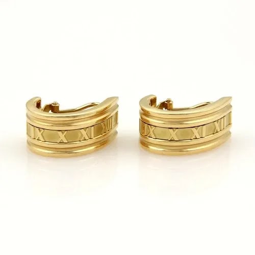 TIFFANY & CO. ATLAS EARRINGS 18K YELLOW GOLD ROMAN NUMERAL OVAL HOOP: TIFFANY & CO. ATLAS EARRINGS 18K YELLOW GOLD ROMAN NUMERAL OVAL HOOP Tiffany & Co. Atlas 18k Yellow Gold Roman Numeral Oval Hoop Earrings Description These beautiful authentic earrings are by Tiffany 