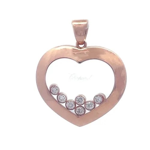 CHOPARD HAPPY DIAMOND GOLD PENDANT 18K ROSE 7 FLOATING HEART SHAPE: CHOPARD HAPPY DIAMOND GOLD PENDANT 18K ROSE 7 FLOATING HEART SHAPE This charming authentic pendant is by Chopard from the Happy Diamond Collection. It is crafted from 18k rose gold with a polished fin