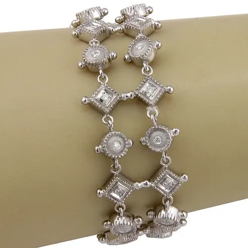DIAMOND GOLD BRACELET 14K WHITE RHOMBUS & ROUND LINK STYLE: DIAMOND GOLD BRACELET 14K WHITE RHOMBUS & ROUND LINK STYLE This beautiful bracelet is crafted from 14k white gold featuring a double row with rhombus and round links, all set with round cut diamonds. 