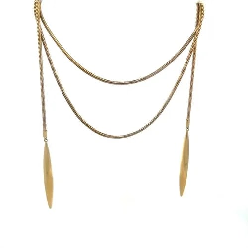 TIFFANY & CO. GOLD FEATHER LARIAT NECKLACE 18K YELLOW DOUBLE PENDANT OR BELT: TIFFANY & CO. GOLD FEATHER LARIAT NECKLACE 18K YELLOW DOUBLE PENDANT OR BELT This is a vintage Tiffany & Co. necklace or belt featuring a lariat style with a double pendant in the shape of a feather. 