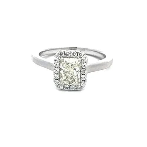 FOREVERMARK DIAMOND HALO RING 14K WHITE GOLD ENGAGEMENT W/PAPER: FOREVERMARK DIAMOND HALO RING 14K WHITE GOLD ENGAGEMENT W/PAPER This is a stunning engagement or anniversary ring, The top has rectangle bridge with a 1 carat radiant diamond IF clarity in the center 