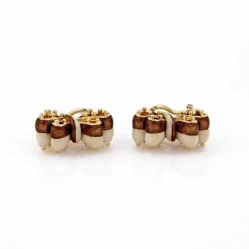 TIFFANY & CO. 18K YELLOW GOLD & ENAMEL DOUBLE RIBBOW BOW POST CLIP EARRINGS: TIFFANY & CO. 18K YELLOW GOLD & ENAMEL DOUBLE RIBBOW BOW POST CLIP EARRINGS Tiffany & Co. Enamel 18k Yellow Gold Double Ribbon Bow Post Clip Earrings This adorable pair of authentic earrings are by Ti