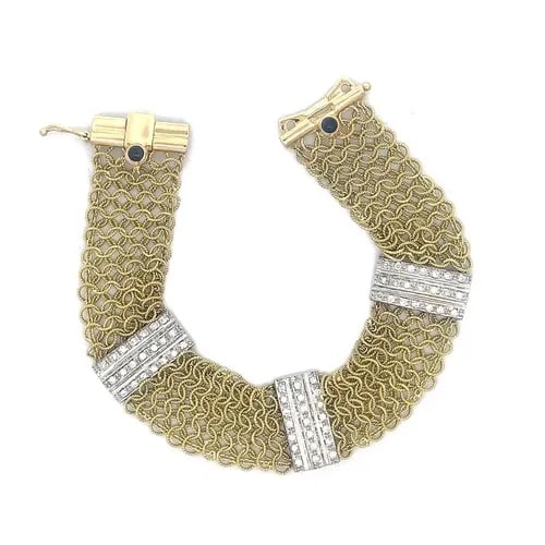 DIAMOND 18K GOLD BRACELET TWO TONE BAR MOTIFS WIDE MESH FLEXIBLE CHAIN: DIAMOND 18K GOLD BRACELET TWO TONE BAR MOTIFS WIDE MESH FLEXIBLE CHAIN This lovely bracelet is crafted from 18k yellow gold with white gold accent featuring milgrain interlaced chain links 16mm wide i