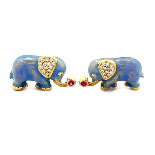FABERGE DIAMOND GOLD ELEPHANT CUFFLINKS 18K YELLOW ENAMEL & GEMS: This adorable pair of cufflinks are authentic from Faberge, they are 18k yellow gold elephant cufflinks, featuring periwinkle blue guilloche enamel body with pave diamond ears and eye and a red gemsto