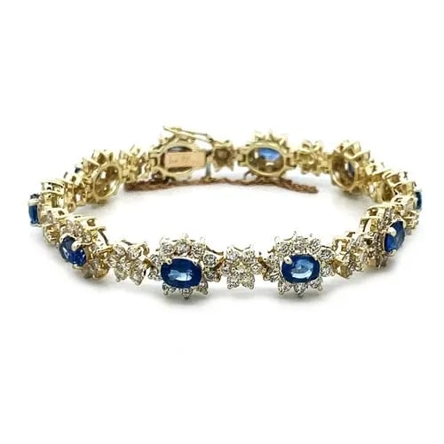 DIAMOND SAPPHIRE GOLD BRACELET 14K YELLOW FLORAL LINK STYLE: DIAMOND SAPPHIRE GOLD BRACELET 14K YELLOW FLORAL LINK STYLE Add this exquisite diamond and sapphire gold bracelet to your collection today! It is a stunning piece of fine jewelry featuring a full leng