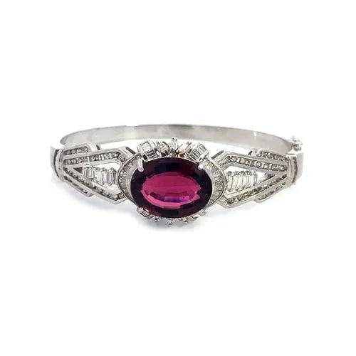 TOURMALINE DIAMOND GOLD BRACELET 14K WHITE SOLITAIRE CUFF: TOURMALINE DIAMOND GOLD BRACELET 14K WHITE SOLITAIRE CUFF This lovely bracelet is crafted from 14k white gold featuring a hinged mechanism on one side with push lock clasp and latch. The front part of