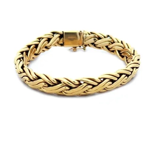 ;TIFFANY & CO. GOLD BRACELET 18K YELLOW BYZANTINE DESIGN VINTAGE: This product is a stunning 18k yellow gold bracelet designed by Tiffany & Co. The Byzantine style adds a touch of elegance to the piece, making it a perfect accessory for women who appreciate vintage 