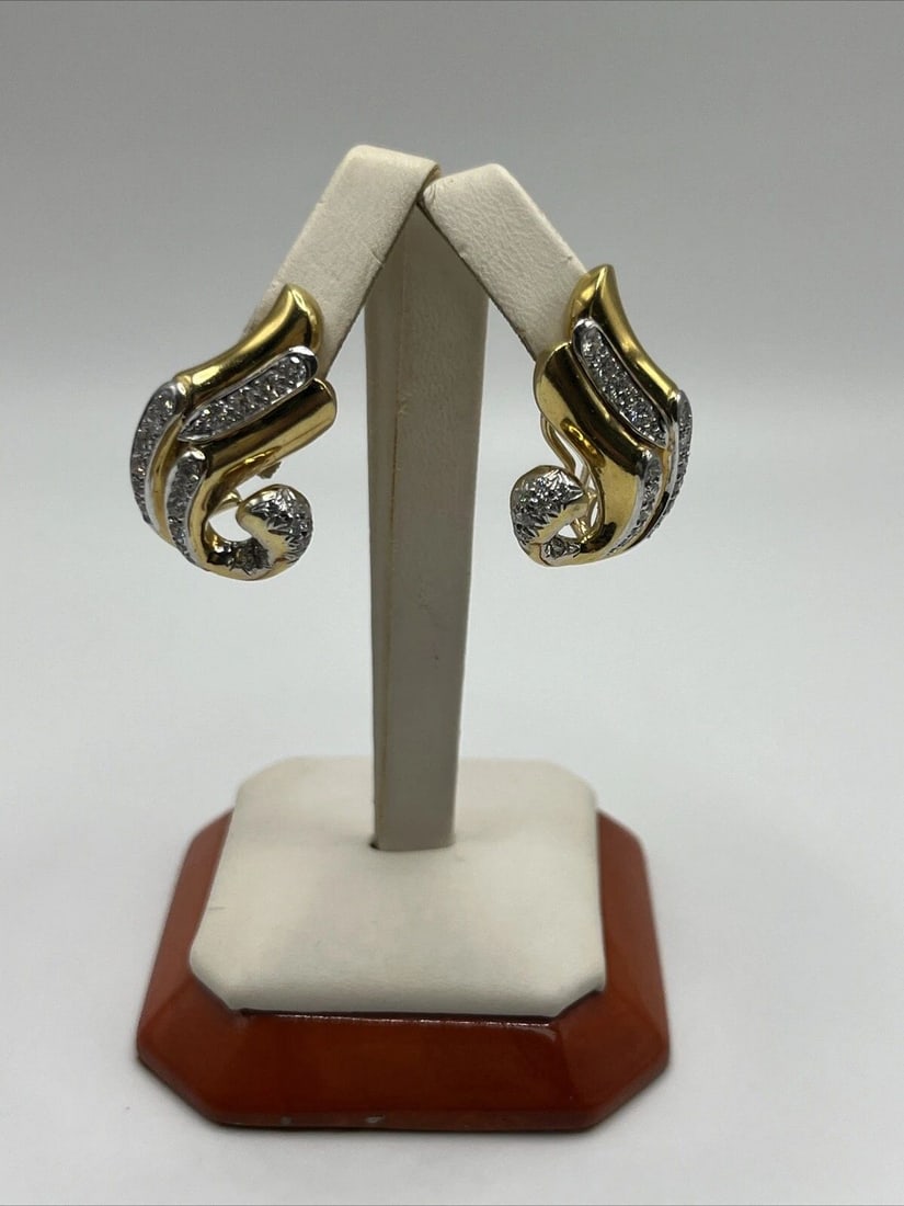 18K YELLOW GOLD & DIAMOND OMEGA BACK CLIP ON EARRINGS: 18K YELLOW GOLD & DIAMOND OMEGA BACK CLIP ON EARRINGS 18K YELLOW GOLD & DIAMOND OMEGA BACK CLIP ON EARRINGS Add a touch of elegance to your outfit with these beautiful 18K yellow gold and diamond earr
