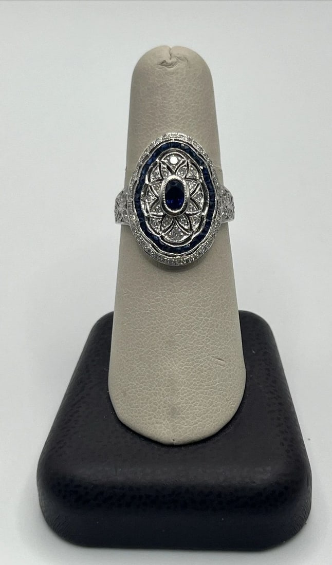14K WHITE GOLD, DIAMOND & SAPPHIRE RING SIZE 7.75: 14K WHITE GOLD, DIAMOND & SAPPHIRE RING SIZE 7.75 14K WHITE GOLD, DIAMOND & SAPPHIRE RING SIZE 7.75 Elevate your jewelry collection with this stunning 14K white gold ring featuring a brilliant blue sa