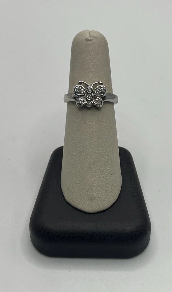 14K WHITE GOLD & DIAMOND BUTTERFLY RING SIZE 7: 14K WHITE GOLD & DIAMOND BUTTERFLY RING SIZE 7 14K WHITE GOLD & DIAMOND BUTTERFLY RING SIZE 7 This stunning butterfly ring is a must-have for any jewelry collection. Crafted from 14k white gold, this 