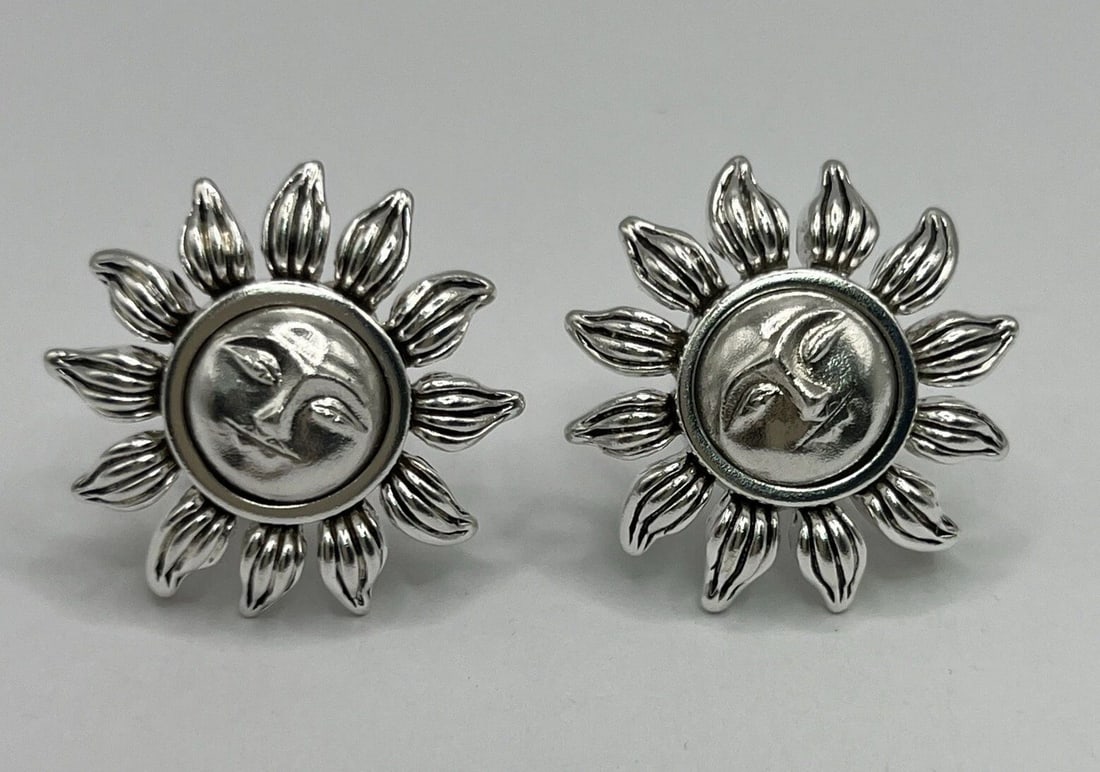 TIFFANY & CO. SUNBURST SILVER EARRINGS (CLIP ON): TIFFANY & CO. SUNBURST SILVER EARRINGS (CLIP ON) TIFFANY & CO. SUNBURST SILVER EARRINGS (CLIP ON) These stunning Tiffany & Co. silver clip-on earrings are perfect for any occasion. The sunburst sh