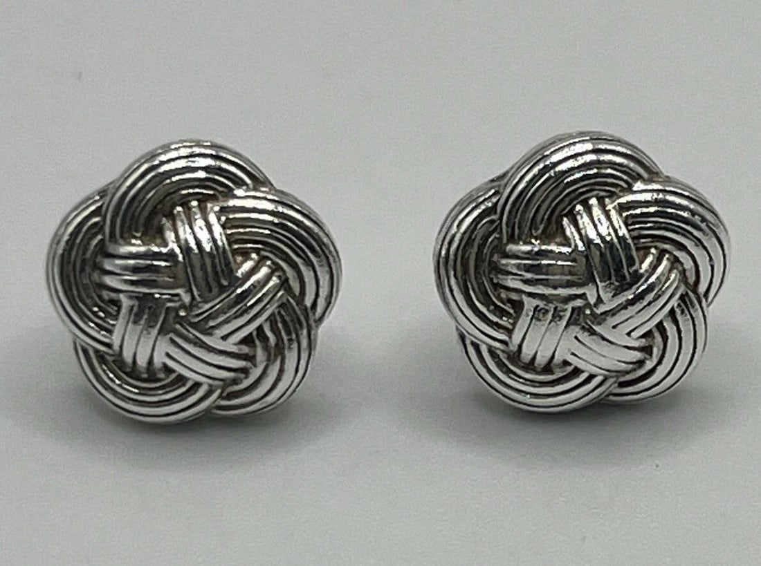 TIFFANY & CO. LOVE TWIST KNOT WOVEN BUTTON STUD EARRINGS (RETIRED): TIFFANY & CO. LOVE TWIST KNOT WOVEN BUTTON STUD EARRINGS (RETIRED) TIFFANY & CO. LOVE TWIST KNOT WOVEN BUTTON STUD EARRINGS (RETIRED) Elevate your style with these stunning Tiffany & Co. braided earri