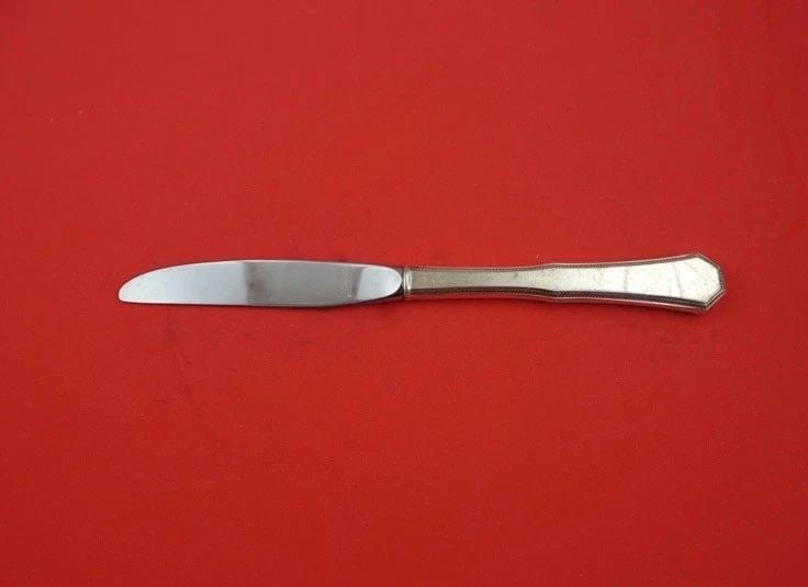 AMERICAN FEDERAL BY REED AND BARTON STERLING SILVER REGULAR KNIFE MODERN 9": AMERICAN FEDERAL BY REED AND BARTON STERLING SILVER REGULAR KNIFE MODERN 9" The American Federal by Reed and Barton Sterling Silver Regular Knife is a modern 9-inch blade made of high-quality sterling