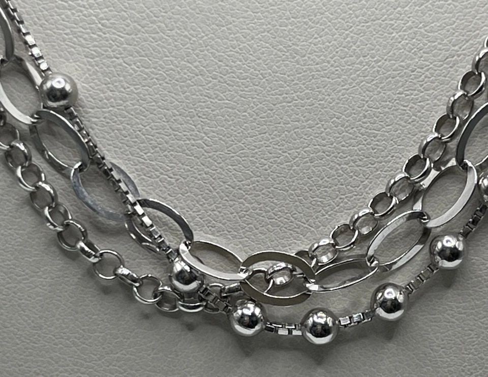 18" MULTI LAYER STERLING SILVER NECKLACE: 18" MULTI LAYER STERLING SILVER NECKLACE 18" MULTI LAYER STERLING SILVER NECKLACE This 18" necklace is a beautiful piece of fine jewelry that will complement any outfit. Crafted from high-quality 925 
