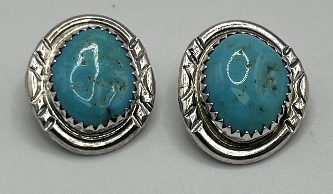 STERLING SILVER & OVAL TURQUOISE CLIP ON EARRINGS: STERLING SILVER & OVAL TURQUOISE CLIP ON EARRINGS STERLING SILVER & OVAL TURQUOISE CLIP ON EARRINGS Add a touch of Southwestern style to your outfit with these stunning clip-on earrings. Crafted from 